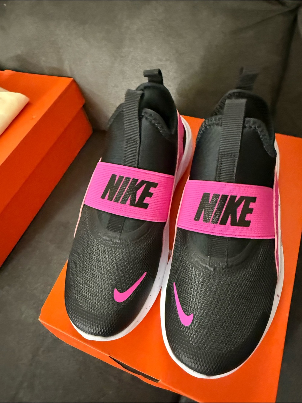 Nike Black Slip-On Sneakers with Hot Pink Accents